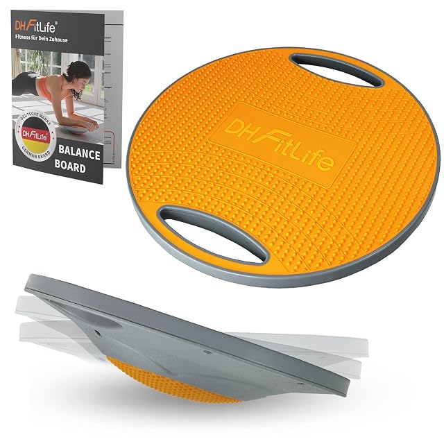 Tabla de equilibrio redonda DH FitLife, cara superior naranja con tacos sobre un borde gris, dos asas recortadas y un folleto al lado
