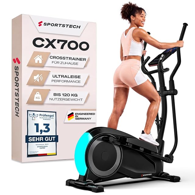 Crosstrainer Sportstech CX700 con la carcasa del volante iluminada en cian, junto a su caja con un sello Prüfengel 1,3 SEHR GUT