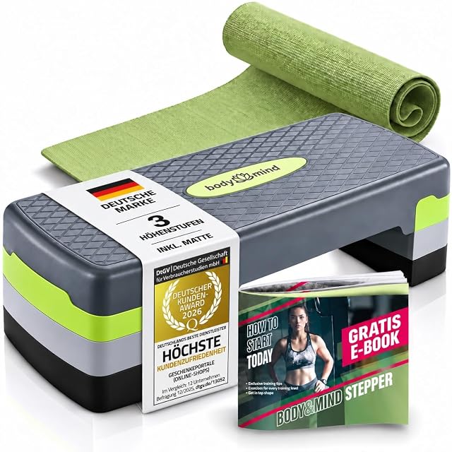 Step Body & Mind gris y lima con esterilla verde enrollada, un libro electrónico y un sello de premio de clientes DtGV