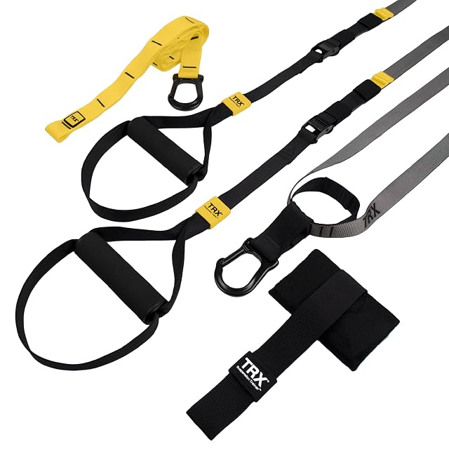 Cintas TRX GO en negro, amarillo y gris con anclaje de puerta, empuñaduras de espuma, estribos y una funda plana de viaje