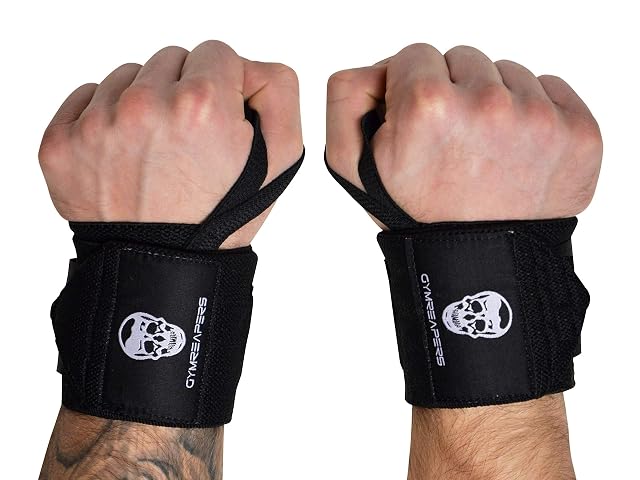 Muñequeras Gymreapers negras con lazadas de pulgar reforzadas y cierres anchos